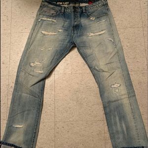 Light-Blue Washed Cult Of Individuality Jeans